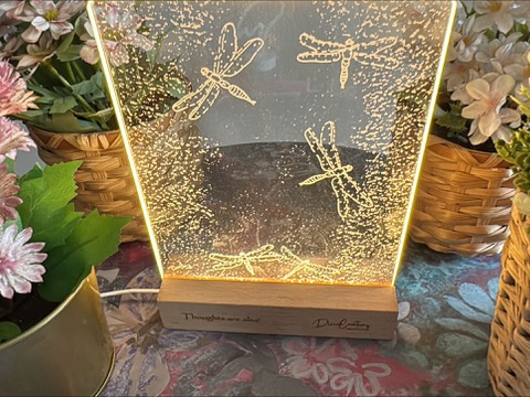 Artistic lamps (theme based) with title + company logo